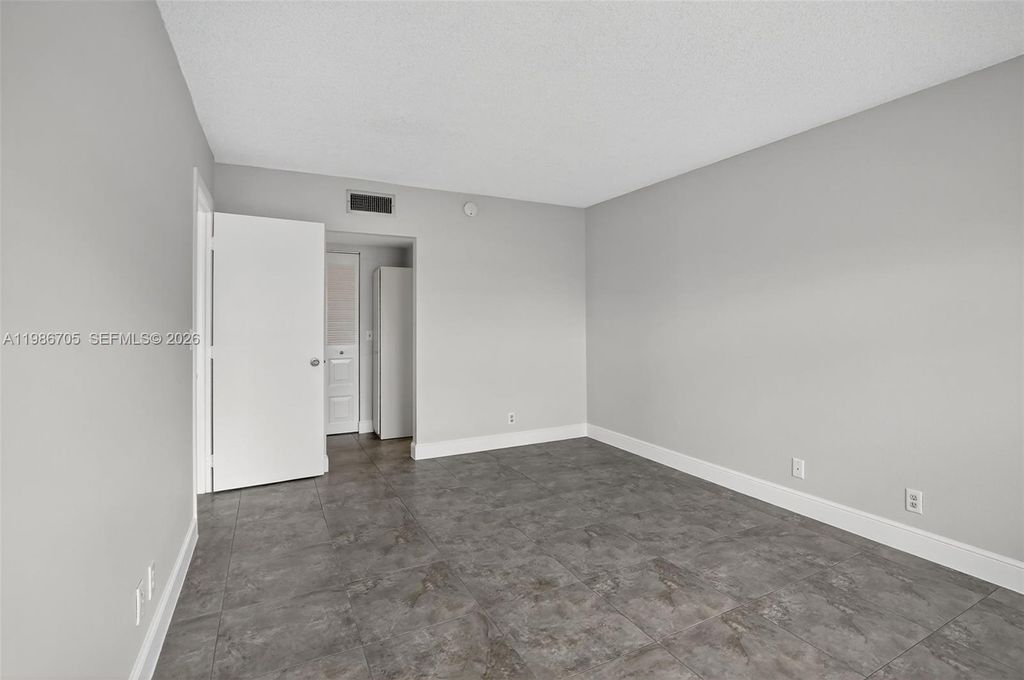 Photo of 3050 NE 16th Ave #407, Oakland Park, FL 33334 (MLS # A11986705)