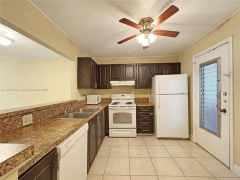 Photo of 410 NW 68th Ave #207, Plantation, FL 33317 (MLS # A11761047)