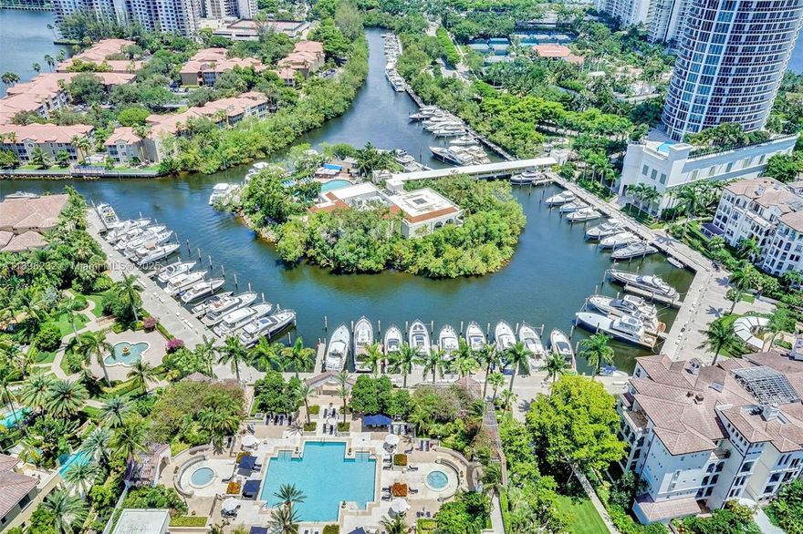 PREMIER 7000 ISLAND BLVD - BUILDING HAS BEEN COMPLETELY REMODELED & KNOWN FOR HAVING THE LOWEST MAINTENANCE FEES IN WILLIAMS ISLAND. THIS SPACIOUS 2 BEDROOM/2 BATH OFFERS A SPLIT FLOOR PLAN & SPECTACULAR VIEWS OF THE INTRACOASTAL + CITY. LARGE GLASS TERRACE. SEPARATE DINING ROOM CAN BE A DEN OR 3RD BEDROOM. GORGEOUS NEW POOL DECK, LOBBY, HALLWAYS, COMMON ROOMS, & BRAND NEW GYM.
THIS 84 ACRE ISLAND PARADISE OFFERS COUNTRY CLUB AMENITIES FEATURING STATE OF THE ART SPA BLDG W/WORKOUT CLASSES, INDOOR SWIMMING POOL, 15 TENNIS COURTS, PICKLE BALL CLUB, KIDS TENNIS CAMP/LESSONS, 3 RESTAURANTS, STARBUCKS, DELI, KID'S PLAYGROUND, MARINA, COURTESY BUS, EXERCISE PATH, & MORE!