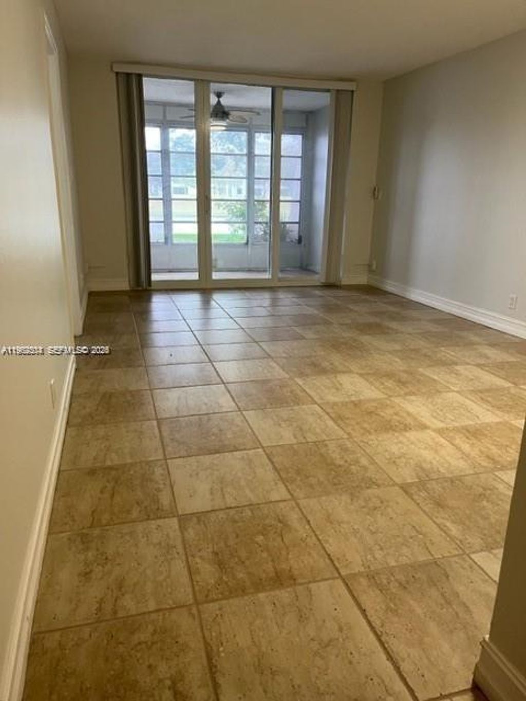 Photo of 9235 Lagoon Pl #111, Davie, FL 33324 (MLS # A11962304)