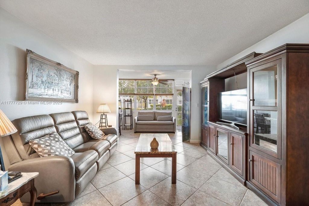 Photo of 609 NE 14th Ave #105, Hallandale Beach, FL 33009 (MLS # A11777729)