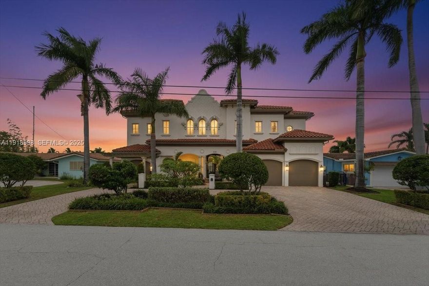 This Is The Waterfront Estate Everyone Is About To Talk About. Custom Built With Only ONE Owner Ever Having Lived Here And Meticulously Maintained With CBS Construction, Superior Elevation And Premium Finishes Throughout. Positioned On 80 Ft Of Prime Deepwater With No Fixed Bridges And Intracoastal Access Allowing Ocean Entry, This Estate Is Catamaran Approved With Newly Installed Boat Lift, 4 Car Garage Parking, And Exceptional Dockage For Serious Boaters. Inside, Dramatic Soaring 23 Ft Ceilings Greet You Along With A Sculptural Spiral Staircase, Private Elevator, Private Theater, Wine Cellar, Plantation Shutters, Marble And Tile Flooring, And 3 Balconies Including A Rooftop Deck Framing Water Views Like Art. The Chef’s Kitchen Features A Natural Entertaining Flow To Formal And Casual Dining Areas. 4 HVAC Zones And Full Impact Protection Provide Peace Of Mind. Convenient To Top Local Dining, Nightlife And Waterfront Spots In Pompano Beach Which Boasts A Coastal Lifestyle, Annual Festivals And Easy Access To Atlantic Beaches. Only Minutes To Streetside Entertainment, Community Parks, Amphitheater Concerts And White Sand Beaches With Atlantic Ocean Access. Outside Feels Like A Private Resort With Sparkling Pool, Wide Water Views And Lush Landscaping Where Every Day Feels Like A Celebration Of Style And Comfort. This Home Doesn’t Whisper Luxury. It Stands In It. Ask Me About The Feature Lists + Architectural Plans & Flamingle On Over!