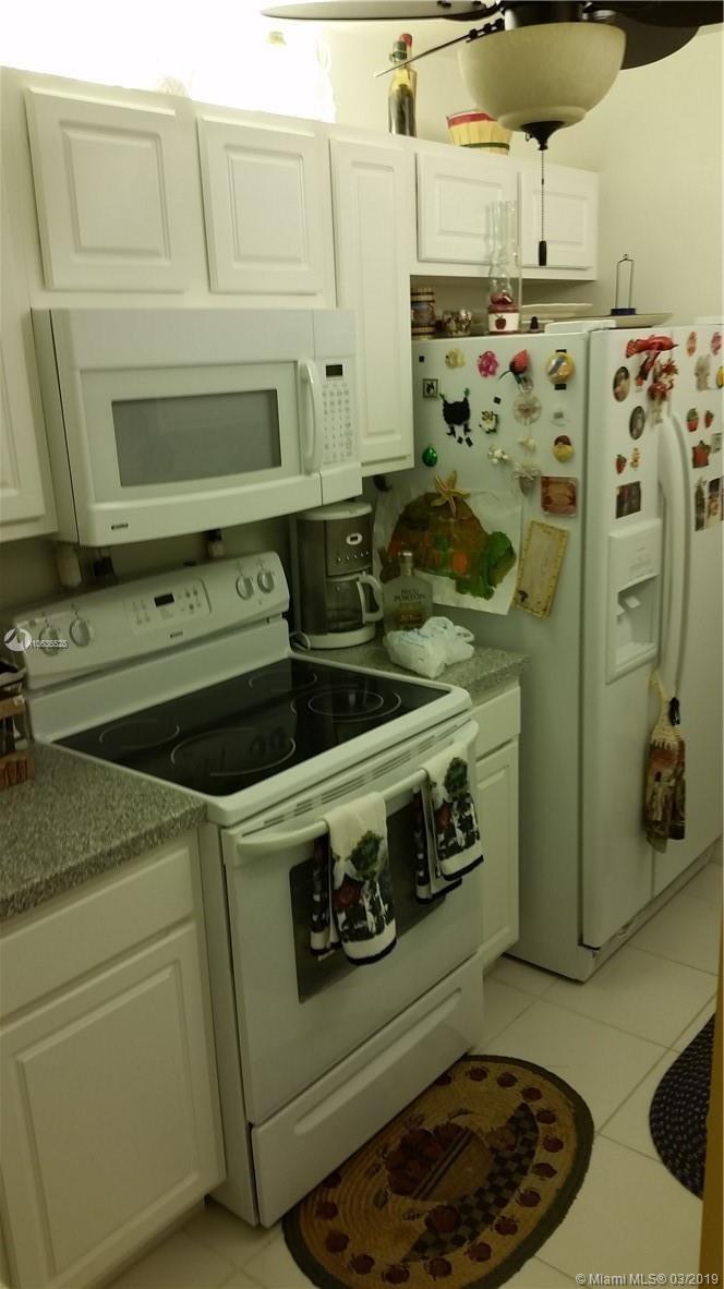 Amazing Find in Lauderhill! Beautiful Updated 1 Bedroom 1 1/2 Bath Condo. Large Kitchen with New Cabinets & Granite Countertop. Both Bathrooms Are Fully Updated with Backsplashes and Granite Countertops. Huge Laundry Room in Unit, Beautiful View From the Screened in Balcony. Master Bedroom Has a Spacious Walk-In Closet With an Additional 2 Closets. Formal Dining Area and Living Room. Association Fee Includes Outside Maintenance, Pest Control, Water & Sewer. A Must See!