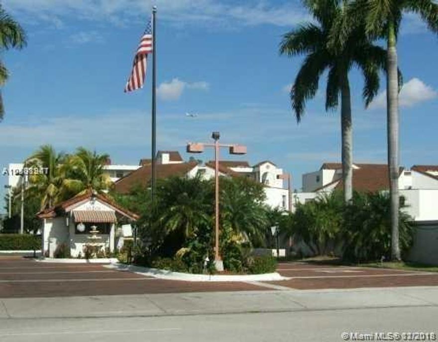 TRANQUIL AND CENTRALLY LOCATED GUARD GATED COMMUNITY, 2/2, CERAMIC TILE AND GRANITE AND WOOD CABINET KITCHEN, overlooking the lake.