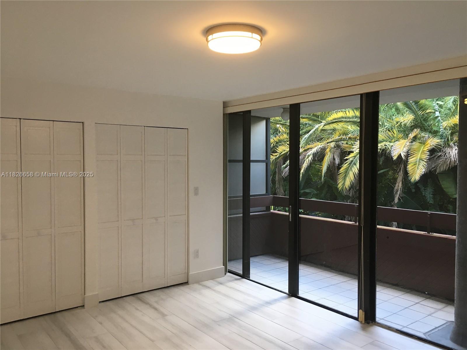 A THRU GEM. Unique opportunity to live in a fully remodeled modern 2 story 2 BED 2 BATH TOWNHOUSE right in a STABLISHED COMPLEX WITH ONLY 14 UNITS IN BEAUTIFUL COURTYARD SETTING Right on BRICKELL AVE. Features laminated wood throughout the unit, step-down living room with operational fireplace, open concept kitchen and formal dining great for entertaining! Full Bathroom downstairs, Spiral staircase lighted by Skylight, 2nd floor, Bedrooms upstairs with Jack and Jill Bathroom, Walk-in closet, Fenced Modern Patio with concrete floor and beautiful garden perfect for Pet & BBQing. RARELY AVAILABLE. Lovely pool. Washer & Dryer in Unit. 2 PARKING SPACES, if rented by two tenants with two cars. Tenant pays for water and electricity, EASY access to trolley.