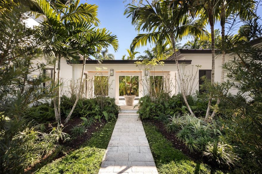 This stunning 2-story residence in prestigious North Coconut Grove features an open-concept layout. Natural light pours in through expansive windows, highlighting the spacious living & dining areas. The modern kitchen boasts top-of-the-line appliances & ample counter space. There are two primary suite bedrooms- including one located on the ground level- and  the home offers exceptional privacy & spaciousness. All bedrooms feature en-suite baths, volume ceilings & large closets. Attached covered walkway leads to extra large 2-car garage. Step outside to your private oasis; a sparkling pool surrounded by lush landscaping, ideal for relaxation or outdoor entertaining. Close to the historic Grove village’s boutiques, cafes and bayfront parks & marinas. Minutes to downtown, MIA & the Beaches.