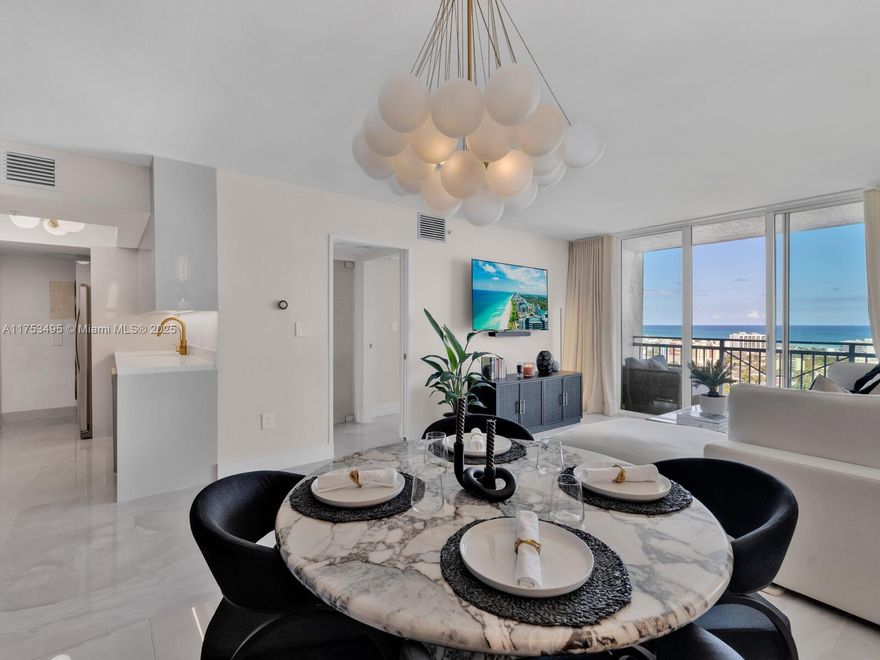 Step into luxury at the Yacht Club at Portofino, in the coveted South of Fifth neighborhood. This stunningly renovated residence offers a sleek, modern design with high-end finishes throughout. The kitchen boasts custom cabinetry, quartz countertops, and gold fixtures, while the spa-like bathroom features a backlit mirror and elegant accents. The living and dining areas exude sophistication with designer lighting and ocean views. The spacious bedroom offers custom closets and a chic feature wall. With a walkability score in the top 10, you're just steps from Miami's best restaurants, the beach, and South Pointe Park. Experience the pinnacle of South Beach living. Come On Tour With Me!