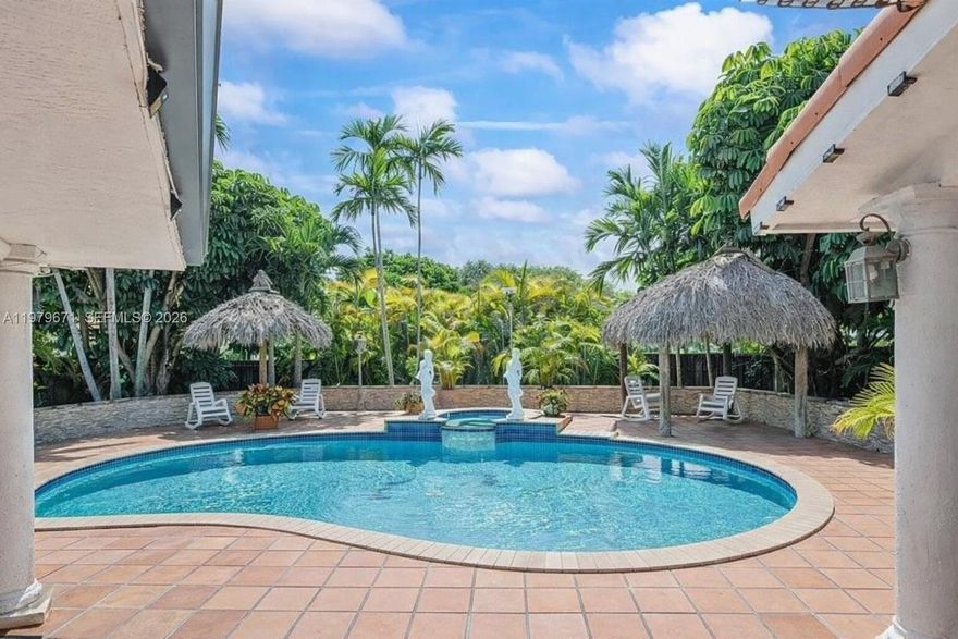 Gorgeous pool home in the heart of Kendall, Miami, just 2–3 minutes from major highways. Located near top A+ schools. Spacious home with over 3,300 sq ft of living space featuring 4 bedrooms, 3 bathrooms, plus in-law quarters. Situated on a 0.33-acre lot with a comfortable open layout, modern Italian-style kitchen, split floor plan with a huge master bedroom, and close to the best restaurants and shopping.