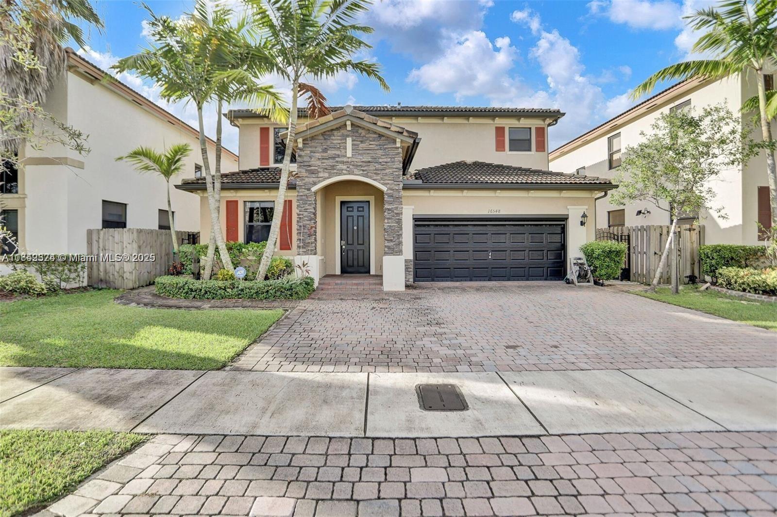 Stunning 5 bedrooms, 3 bathrooms, and two-car garage, and an impeccable custom enclosed terrace with lighting, fans & BBQ area. Ample spaces take over this home from the moment you park until you retreat to your master bedroom. Roomy dining areas, living & family room. Spacious kitchen with granite counter tops with modern appliances is opened to the family room. Second floor, including stairs, feature three rooms with closets and a double-sink bathroom with tub/shower. The master bedroom offers a huge walk-in closet & a master bathroom with double sink, tub, shower & private toilet. There is a fifth room on the first floor, and full bathroom that can be used as another room or office.