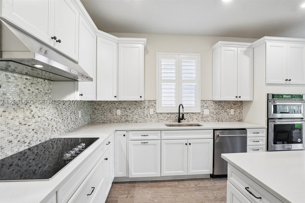 Photo of 1636 Trailhead Ter, Hollywood, FL 33021 (MLS # A12045893)