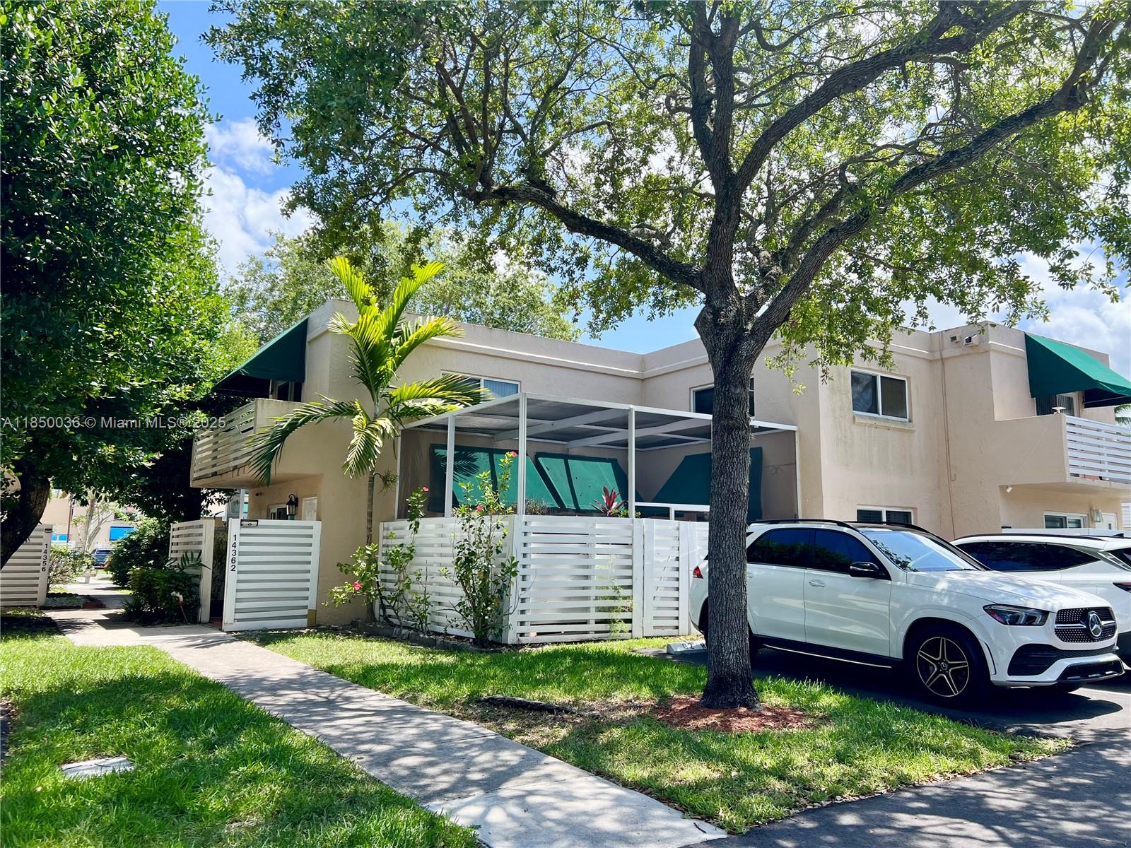 Beautifully maintained townhouse in a desirable community! This fully tiled home features a modern kitchen with granite countertops and Frigidaire appliances, a commercial-sized washer & dryer, and a convenient first-floor bedroom. Enjoy peace of mind with impact windows and doors, plus a screened patio perfect for relaxing. This property boasts a very low HOA with no purchase approval required. Community amenities include a pool and walking path. A must-see!