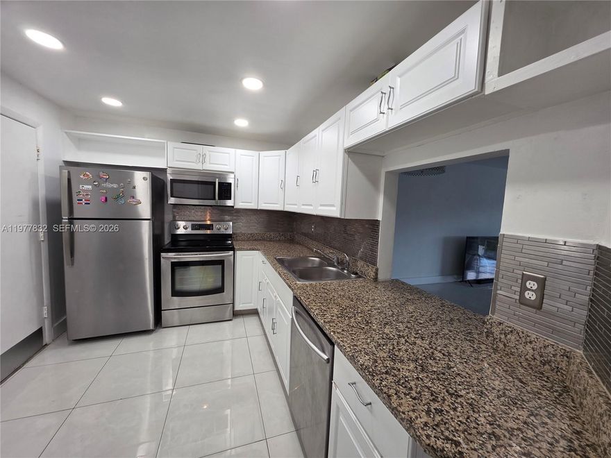 Charming and remodeled 2 bedrooms and 2 baths apartment with screened balcony.. Corner unit. Porcelain tiles throughout. Stainless steel appliances. Brand-new microwave. Granite countertop. New bathrooms. Blackout curtains.  Almost 1,200 Sq. Ft. Plenty of closets space. The building offers a swimming pool and a gym. This beautiful apartment is filled with natural light and features large windows. Plenty of closets space. 1 assigned parking space and plenty of gust parking for the 2nd car. Pets allowed only with ESA certificate. Excellent location* Walking distance of Houses of worship, Shopping centers, I-95/US1/826/Turnpike. Very close to Aventura Mall and minutes away to the beaches. It's located between Miami and Ft. Lauderdale airports. Owner/agent. Easy to show.