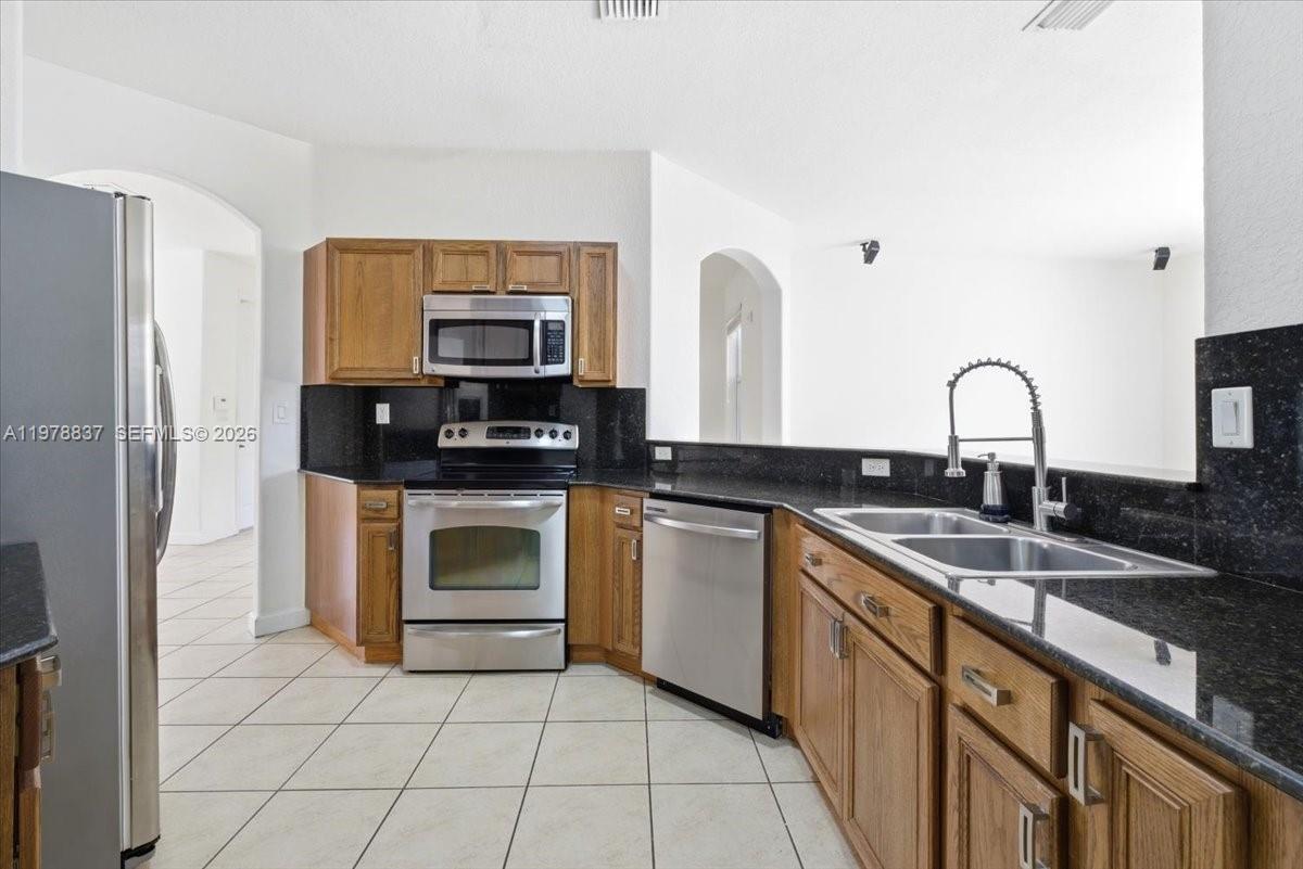 ISLANDS AT DORAL TOWNHOME - Residential