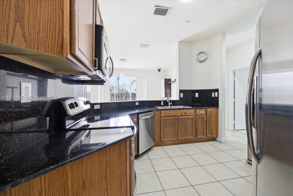 ISLANDS AT DORAL TOWNHOME - Residential