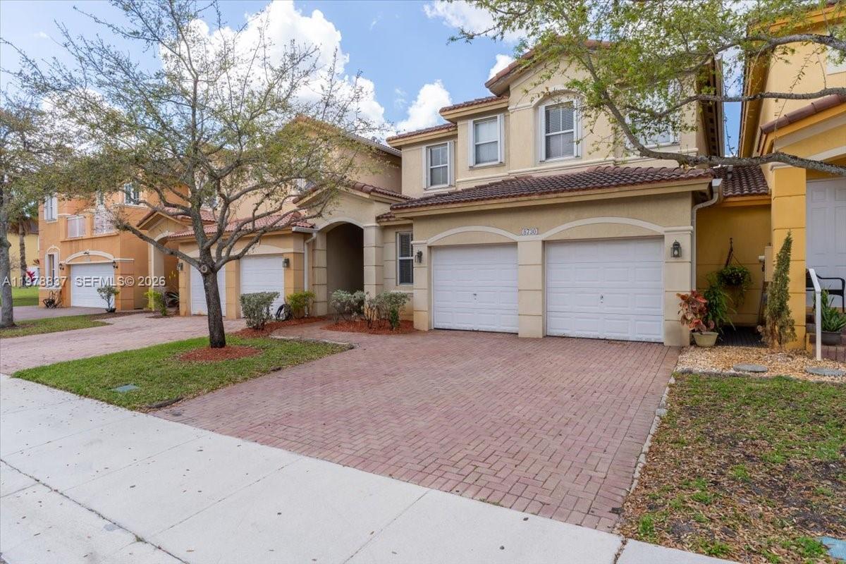 ISLANDS AT DORAL TOWNHOME - Residential