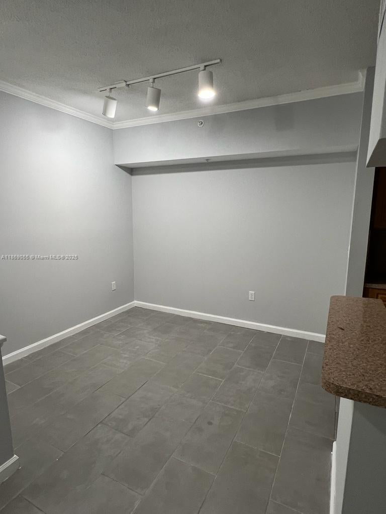 Photo of 11793 W Atlantic Blvd #222, Coral Springs, FL 33071 (MLS # A11869055)