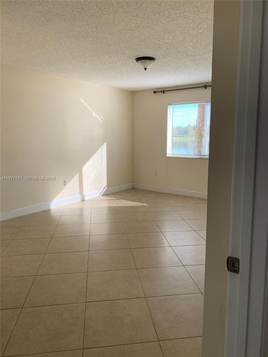 Photo of 5031 Wiles Rd #204, Coconut Creek, FL 33073 (MLS # A11977581)