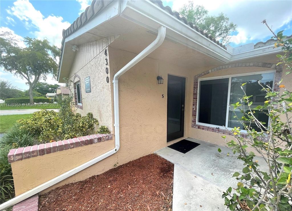 Photo of 4300 NW 110th Ave #S, Coral Springs, FL 33065 (MLS # A11449350)