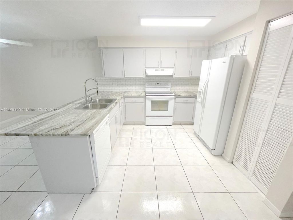 Photo of 4300 NW 110th Ave #S, Coral Springs, FL 33065 (MLS # A11449350)