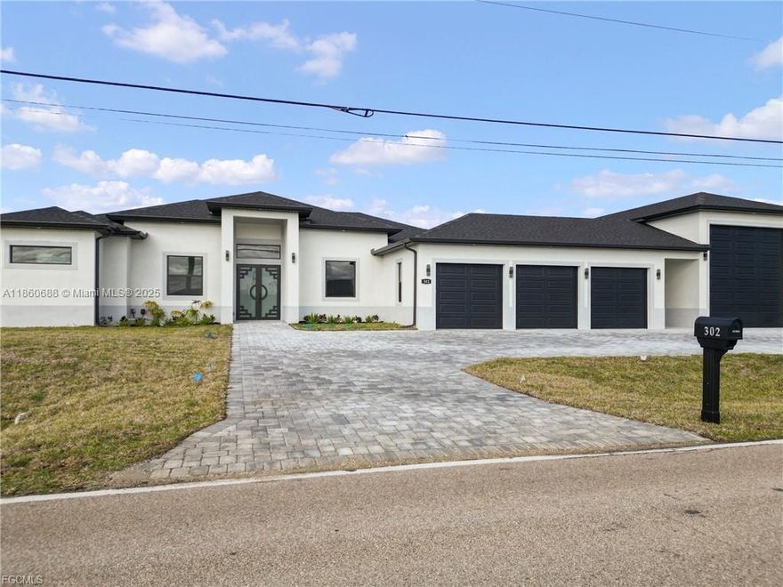 Cape Coral 4BR/3BA luxury home w/ pool, spa, outdoor kitchen, 3-car garage, RV parking, impact windows, chef’s kitchen & stunning master suite.
