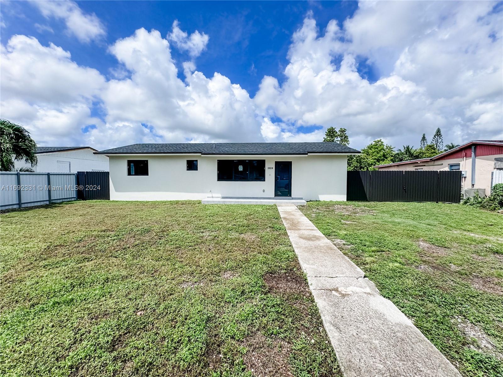 Beautiful renovated 3/2. Impact doors and windows. New roof, AC and ducts, electrical, plumbing, floors, baths. Won't last!!