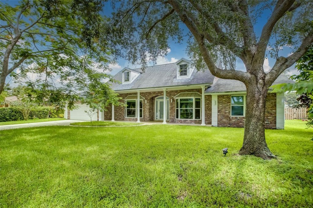 Photo of 9501 Sea Turtle Mnr, Plantation, FL 33324 (MLS # A11702995)