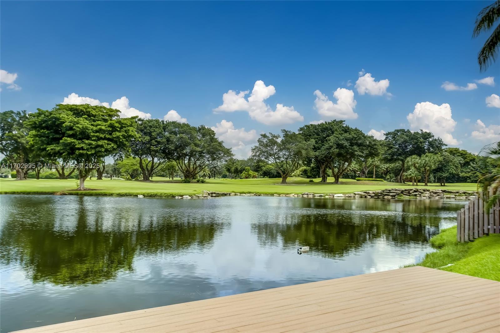 Beautiful unfurnished 3 bedroom estate home (4 Bedrooms per tax roll) nestled in the highly desirable community of Jacaranda Country Club, in the heart of Plantation w/ easy highway access & shopping. Great community to exercise in, w/ friendly neighbors. Trophy lot, w/ over 13,000 sq ft of golf course, amazing waterfront & Pool views. Open, split floor plan w/ approx 3,500 sq ft under air, a gorgeous modern kitchen, w/ Bosch appliances, impact glass, gorgeous tile flooring w/ a water view from most rooms. 2 Spacious Master Bedrooms, great for in-laws. Florida Room can be a den / office w/ access to patio & deck. Large 2 car garage + laundry rm + pantry. Well maintained. Annual lease, available now. Tenant provides background check & credit report. Interview & 2 Security Deposits required.