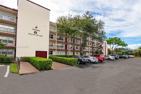 Photo of 1551 SW 135th Ter #108G, Pembroke Pines, FL 33027 (MLS # A11874370)