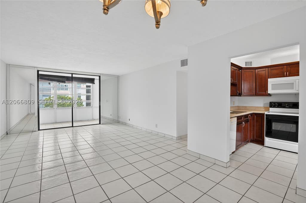 Photo of 2821 Somerset Dr #317, Lauderdale Lakes, FL 33311 (MLS # A12066809)