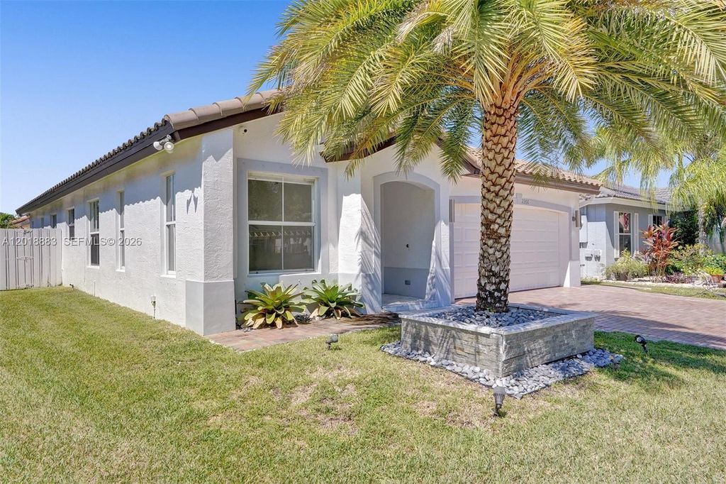 Photo of 2266 NW 208th Ter, Pembroke Pines, FL 33029 (MLS # A12018883)