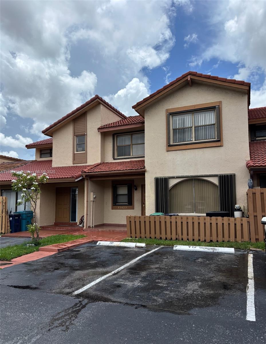Spacious 3-bed, 2.5-bath townhome in Miami’s Tamiami neighborhood with one of the largest layouts in the community (1,954 SF). Same owner since 1984, ready for updates and personal touches. Downstairs features include a generous living area, 1/2 bathroom, and a den. Upstairs large master suite with walk-in closet and ensuite bathroom, 2 spacious bedrooms/closets, and full bath. Accordion shutters throughout, and covered patio perfect for relaxing or entertaining. Gated, security, and low-HOA community offers lakes with scenic ¾-mile walking trail. Plenty of guest parking and easy access to the Turnpike, FIU, top-rated restaurants, shopping, and hospitals. Ideal for buyers seeking value, space, and convenience in a well-located, tranquil setting. Great opportunity to create your dream home.