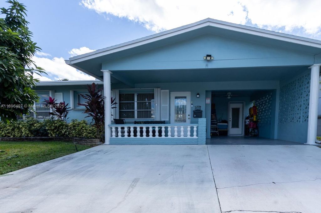 Photo of 4518 NW 45th Ct, Tamarac, FL 33319 (MLS # A11896497)