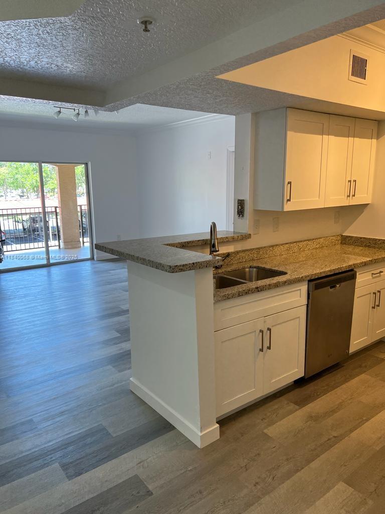 Recently renovated 2-bedroom, 2-bath condo located in the heart of Pembroke Pines. This gated, *non-smoking* community offers exceptional amenities including a swimming pool, indoor racquetball court, and private cinema. The unit includes two assigned parking spaces, one of which is covered. The association application fee is $150. A move-in deposit of $250 is required prior to occupancy. The property will be available starting August 2nd. Only certified assistance pets will be permitted, and a non-refundable pet fee of $60 will apply.