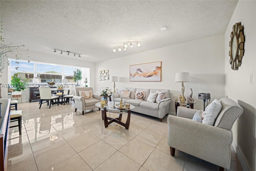 Photo of 8951 Sunrise Lakes Blvd #301, Sunrise, FL 33322 (MLS # A12033958)