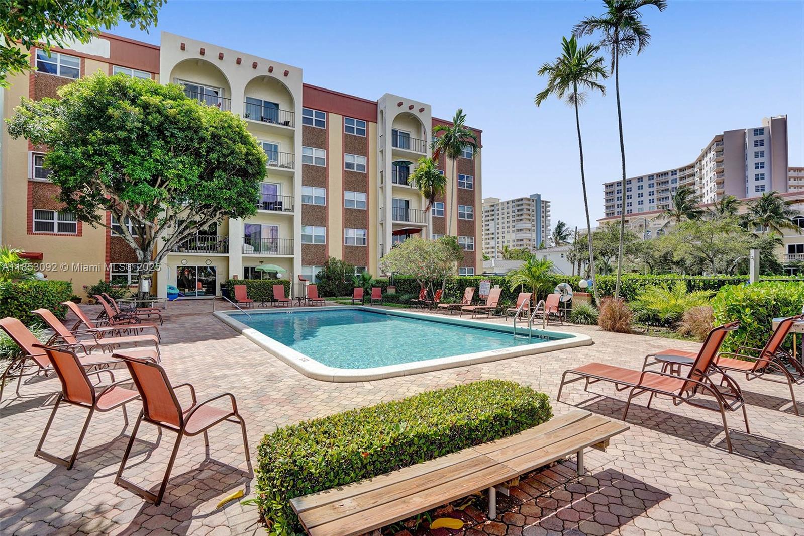 New pics coming Tuesday! Feels like a single-family beach home with all the conveniences, amenities in a condo lifestyle! Friendly Boutique building, 5 stories, 61 units, steps to beach, restaurants, shopping, pier! First floor unit, park at your door, private entrance. Large patio facing east. Renovated to the highest standard. Vinyl flooring, crown molding, textured ceilings, high impact thru-out. Open concept kitchen, custom cabinets, granite, SS appliances. Bathrooms feature walk in tiled showers, granite vanities. 2024 AC/water heater! Great for full, part-time and investor! Rent immediately, min 60 days. Small pet welcome! Low HOA fee collecting for full reserve, 50 year recertification complete, heated pool, grills, storage, washer/dryers every floor. Agent resides in building!