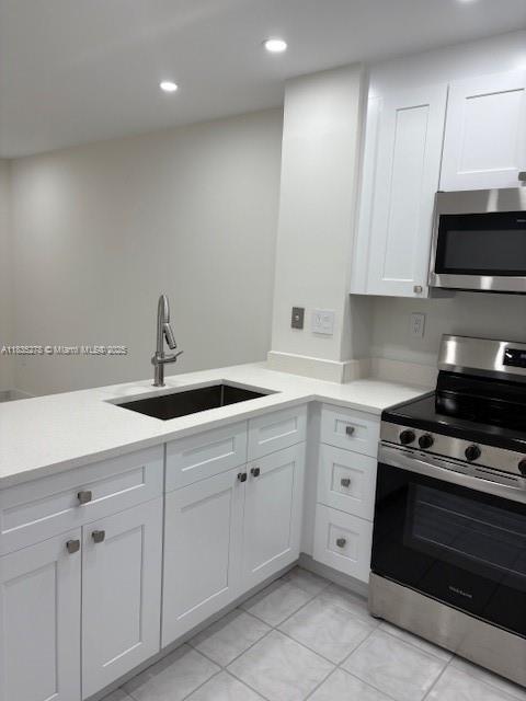 Renovated 1 bedroom 1 bath apartment with washer and dryer in Hialeah Club Villas Condo, in West Hialeah. New appliances, cabinets, sink and counters in kitchen. New vanity, mirror, tub, tiles, glass shower door and flooring in bathroom. Recessed lighting throughout, new fan and blinds in bedroom. Unit is freshly painted and has central air. Small balcony in bedroom. One assigned parking spot plus tons of guest parking. Right next to Bucky Dent Park, walking distance to Mount Sinai Hospital and 5 min to Publix. Great landlord!!