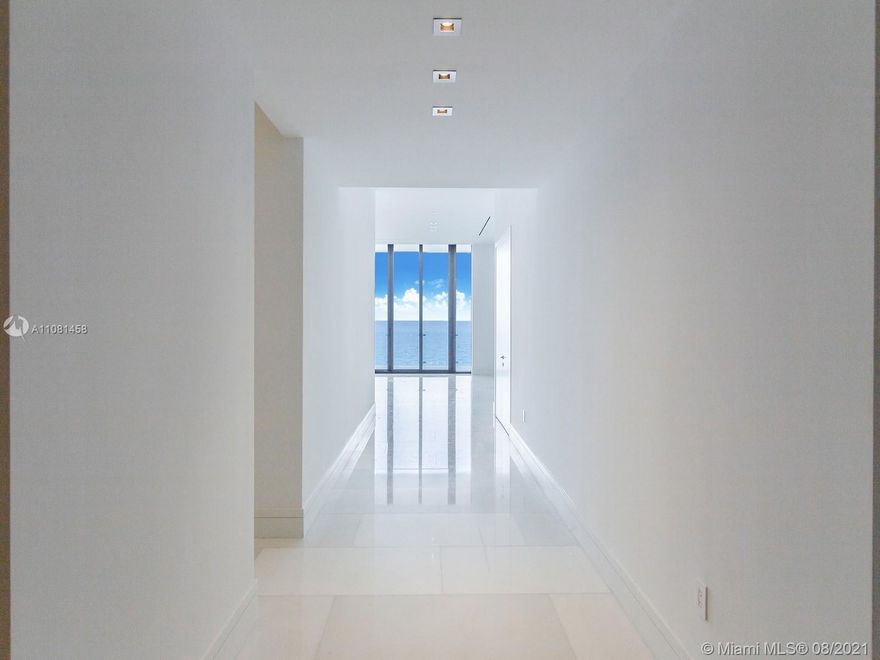 Fabulous ocean views at exclusive MUSE residence. Highlights include private ocean view ,outdoor grill, Large ultra modern sleek TV for your living space. A Large crystal clear television that disappears into your master bath mirror. A biometric safe in the master suite that opens for you and only you. intelligent camera system to enhance security at entry -Sub-Zero dual temperature wine
storage for up to 148 bottles Kitchens are accompanied by exquisite unique marble countertops and top-of-the-line SubZero/Wolf appliances taking your culinary experience to a whole new level. Smart iHome System: Each residence offers unparalleled efficiency through a cutting-edge smart home technology experience. Includes integrated audio, video, lighting, security and shades
systems.