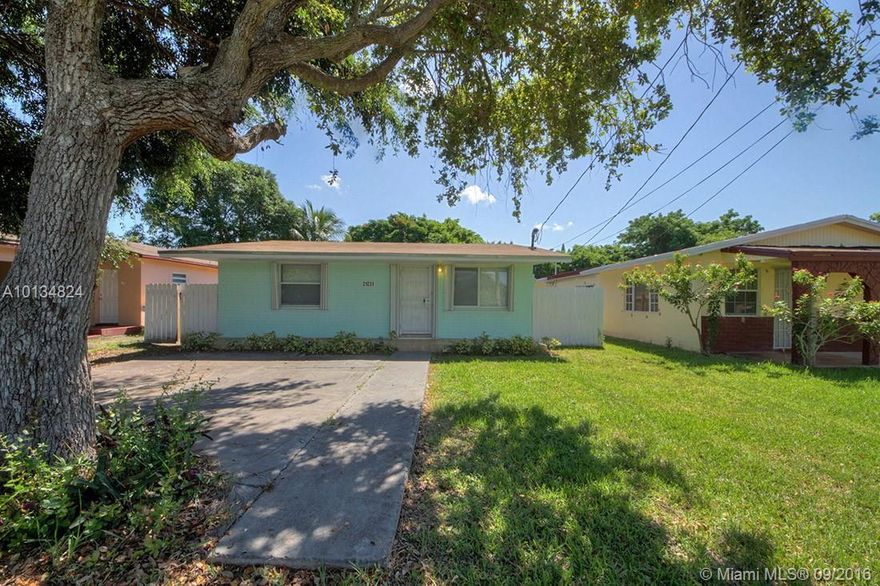Remodeled two bedroom home centrally located near shopping, schools and major highways. Updated kitchen with wood cabinetry, spacious fenced backyard, storm shutters, custom tile bath and tile flooring throughout