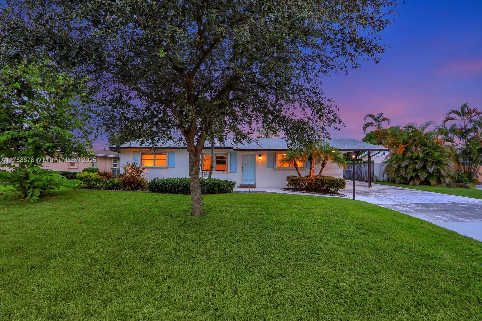 Beautiful Home and Beautiful Location off Prosperity Farms Road in the heart of Palm Beach Gardens. This home is a FIND, it is charming, light & bright, split bedroom plan with TWO living areas, tile flooring throughout for a continuous flow, a wonderful upgraded kitchen that is open to the dining area and one of of the living areas. Master suite has attached full bathroom and a walk-in closet. Two spacious outdoor patios with a large backyard - room for a pool and space to store a boat on the side of the house. Steps from the intercoastal waterway, a short drive to Juno Beach plus minutes from the best local restaurants, Trader Joe's, Publix, Wholefoods and the Gardens Mall. Don't miss this beauty!! NO HOA can easily be rented as an Airbnb or VRBO.