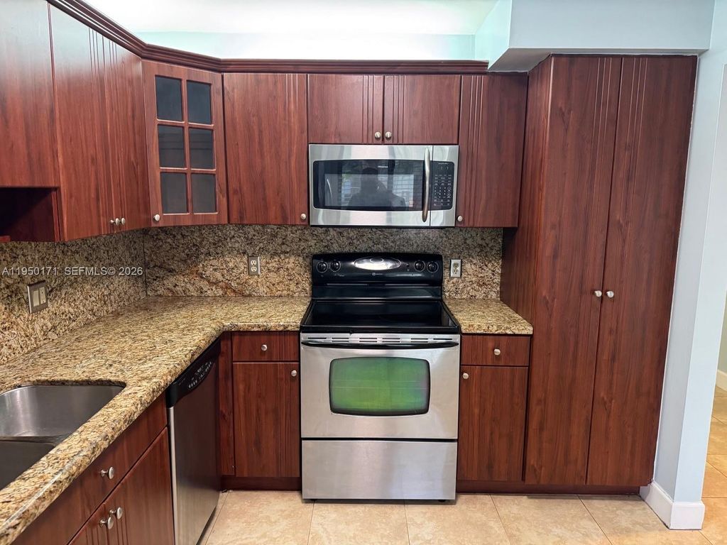 Photo of 16541 Blatt Blvd #203, Weston, FL 33326 (MLS # A11950171)