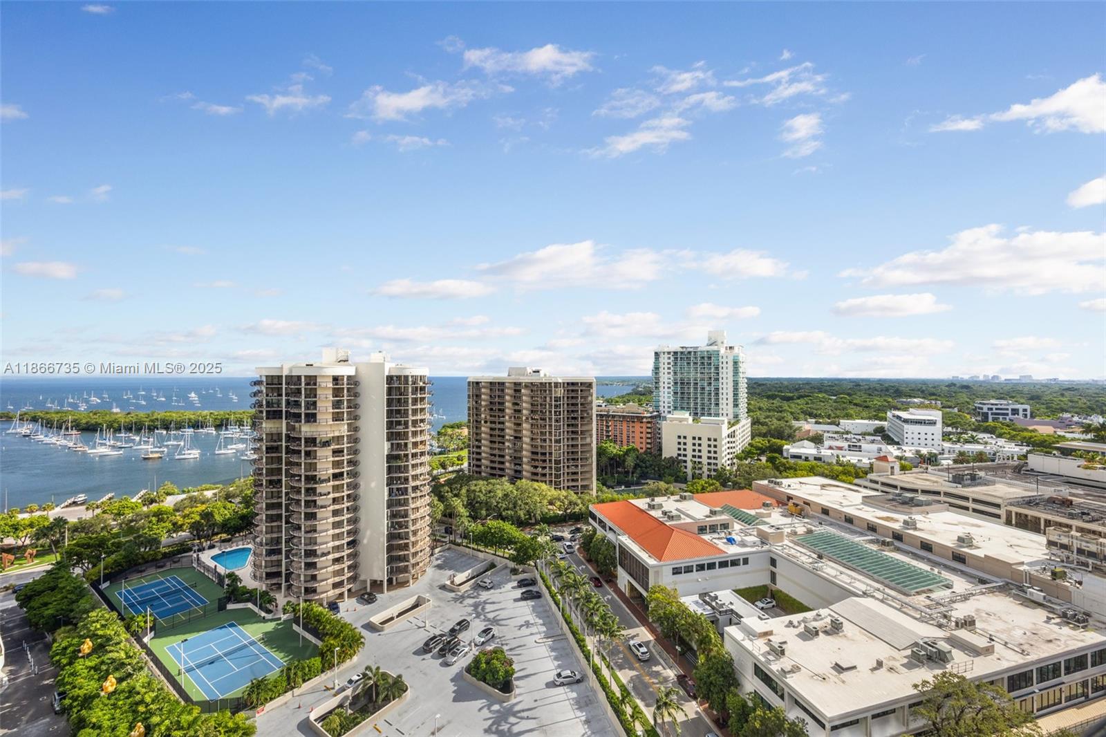 Welcome to Park Grove, Coconut Grove’s premier waterfront address. This coveted 01-line residence offers 3 bedrooms, 2.5 baths, and sweeping views of Biscayne Bay and the city skyline through 10-foot floor-to-ceiling glass. Two oversized terraces extend the living space, ideal for outdoor entertaining. A chef’s kitchen with custom finishes, Wolf/SubZero appliances, and a spacious layout enhances the home’s modern elegance. Residents enjoy world-class amenities including rooftop pool, spa, fitness center, private theatre, business lounge, and dining options. Offered fully furnished with one assigned parking space.