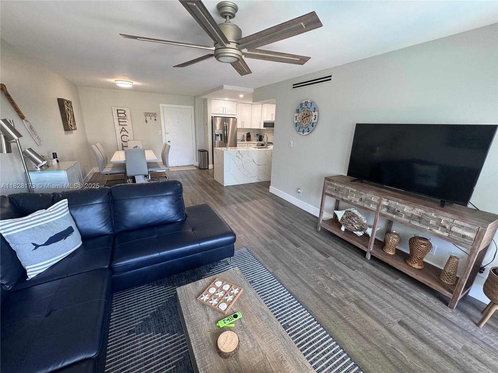 Beautifully updated 2BR/2BA condo located on Ocean Blvd, steps from the beach and across from the Pompano Beach Fishing Village and Pier. This move-in-ready unit features impact windows and doors, a modern kitchen with quartz countertops, white cabinetry, and stainless steel appliances. Laminate wood flooring throughout, spacious layout with ample storage, and a comfortable primary suite with a large en-suite bath. The building has completed both 40- and 50-year inspections. Amenities include a heated pool, BBQ/picnic area, contemporary lobby, updated elevators, community room, and deeded parking with guest spaces—freshly painted exterior. Walk to restaurants, shops, and the pier. Don’t miss this prime beachside opportunity!