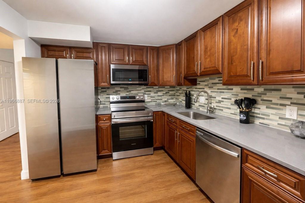 Photo of 16571 Blatt Blvd #204, Weston, FL 33326 (MLS # A11966887)