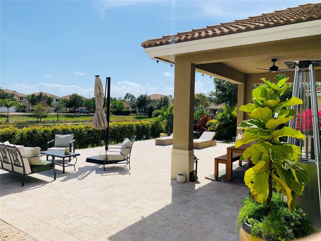 Photo of 4812 Foxtail Palm Ct, Green Acres, FL 33463 (MLS # A11909377)