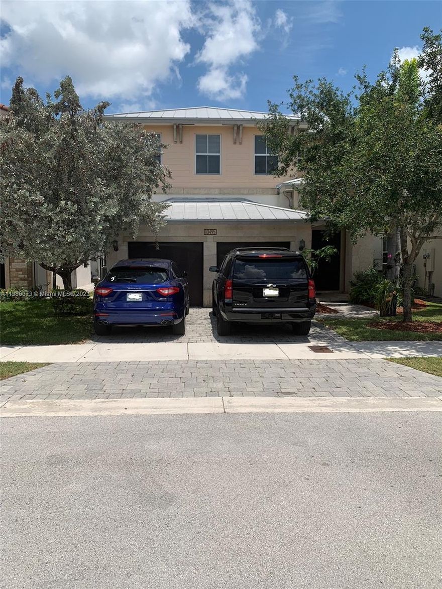 Welcome to Vintage Estates beautiful lake front single family home located in one of Doral's most sought after gated communities. This gorgeous 2,945 sqft home features 4 bedrooms and 4 bathrooms with stainless steel appliances and wood cabinetry throughout the kitchen and bathrooms. Master suite and two additional bedrooms located upstairs. 4th bedroom conveniently located on the main floor. This home is perfect for entertainment. The patio includes an outdoor barbecue kitchen and bar under a covered terrace and much more. Home may be sold with furnishings. Community Club House has pool, bar, gym, party room and more.