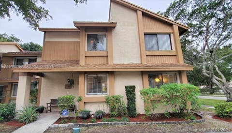 Photo of 40 Wimbledon Lake Dr #216, Plantation, FL 33324 (MLS # A12041388)