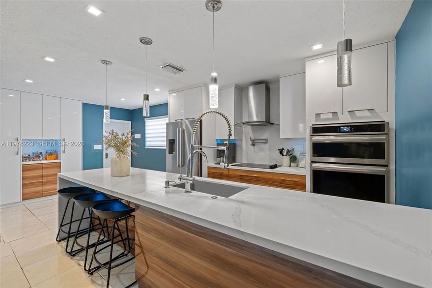 Welcome to this beautifully updated 4-bedroom, 2-bathroom home located in the heart of Lauderhill. This move-in-ready property features a stunning modern kitchen with an eat-in island, chef-style sink, glass cooktop stove, stainless steel extractor hood, and built-in appliances. The kitchen also offers generous built-in pantry storage, making it both stylish and functional. The open-concept layout seamlessly connects the living area and kitchen, creating the perfect space for entertaining family and friends. Both bathrooms have been tastefully updated with modern finishes, adding to the home's fresh and contemporary feel. Step outside to enjoy the spacious patio area with a covered, insulated aluminum roof—perfect for relaxing or hosting summer cookouts. There’s plenty of room to add a hot tub and enjoy the outdoor space year-round while staying cool and protected from the elements. The property is fully enclosed with stylish PVC fencing, providing privacy and a clean modern look.
FHA, VA, and Conventional financing are welcome. Believe Home Loans is offering a credit buydown option to help lower your interest rate. Qualified buyers may purchase with as little as 3% down.
Don’t miss the opportunity to make this beautiful home yours—schedule your showing today!