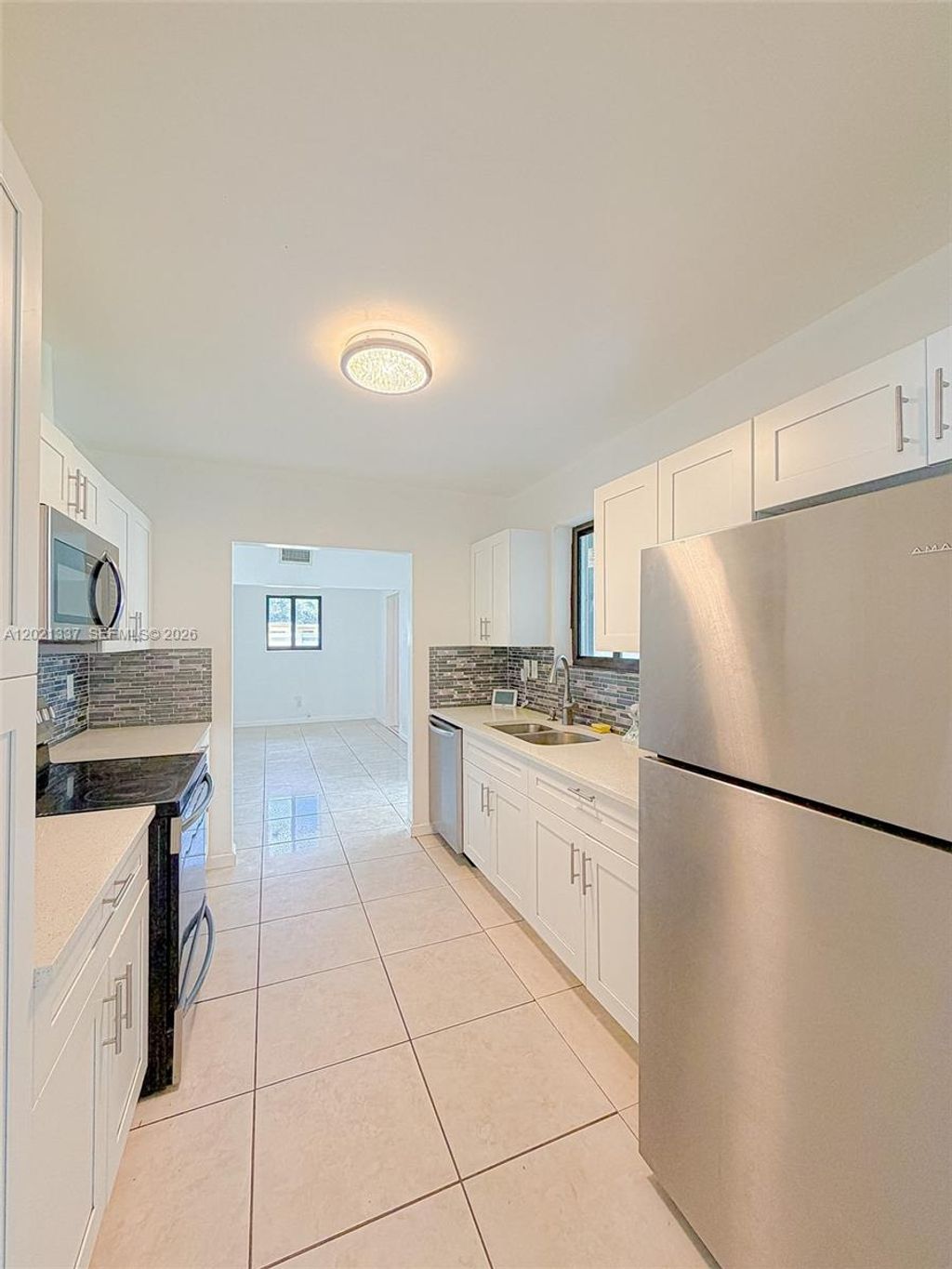 Photo of 1650 NW 26th Ter #0, Fort Lauderdale, FL 33311 (MLS # A12021337)
