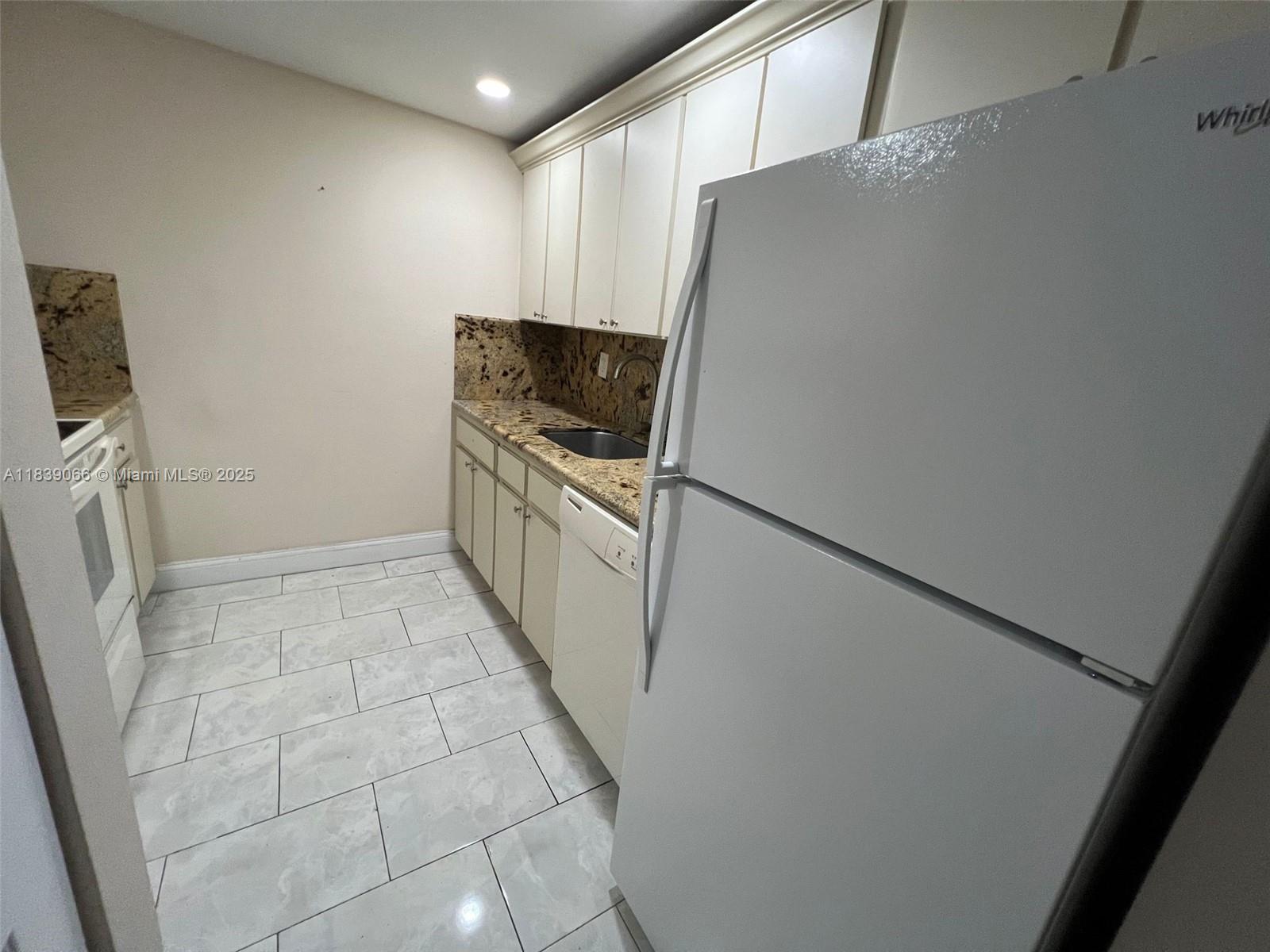 SAGA BAY GARDENS CONDO - Residential