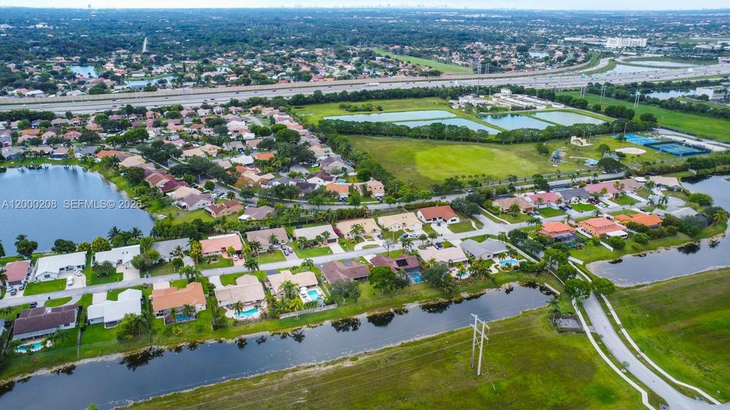 Photo of 15620 Gauntlet Hall Mnr, Davie, FL 33331 (MLS # A12000208)